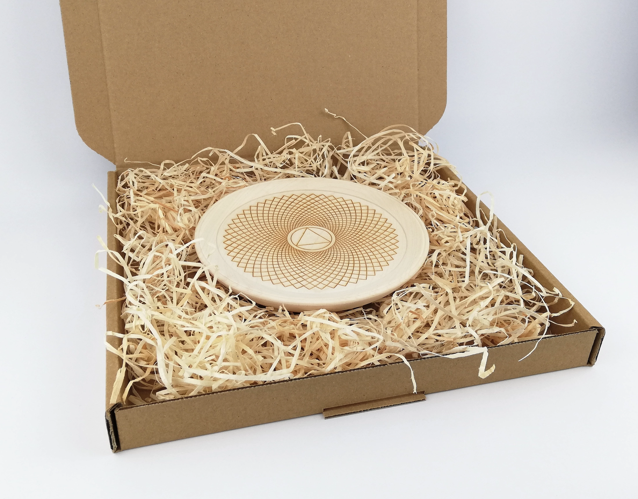 Crown chakra on a small plate (16cm/6.3in in diameter), packed in a box.